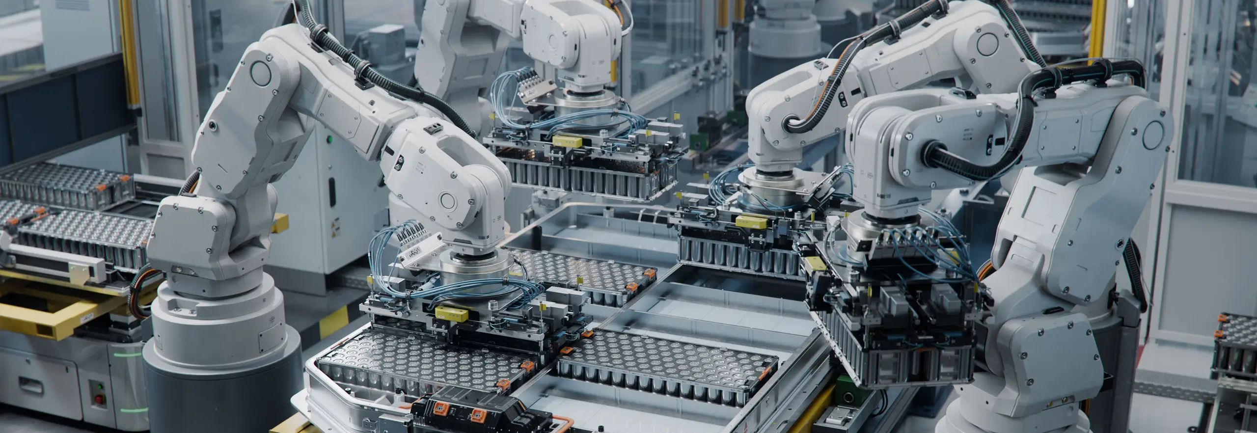 Industrial Robot Arms Assemble Lithium-Ion EV Battery Pack