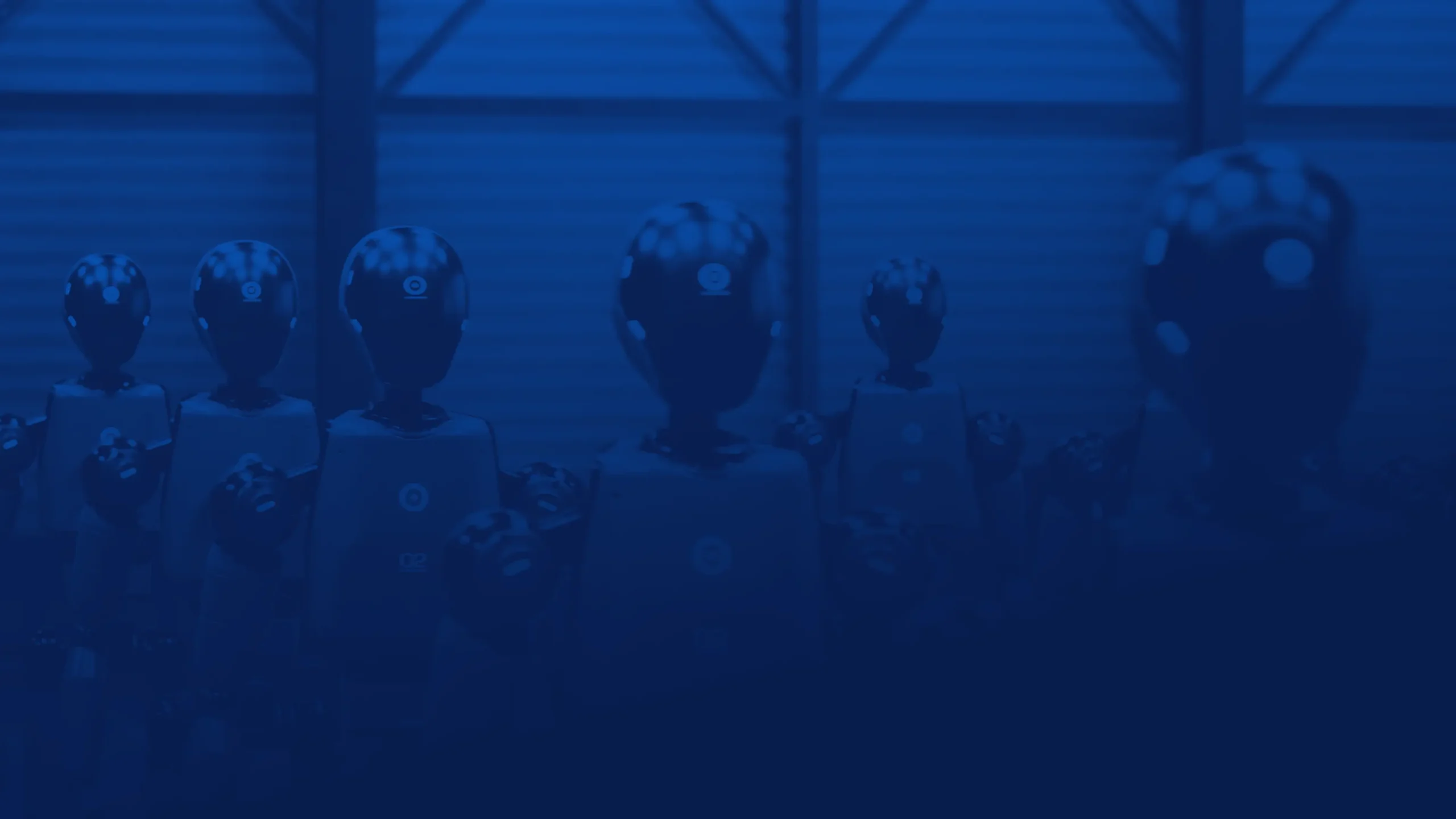 Line of humanoid robots with dark blue overlay